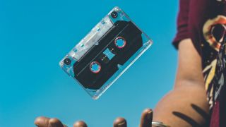 Person Doing Tricks on Cassette Tape